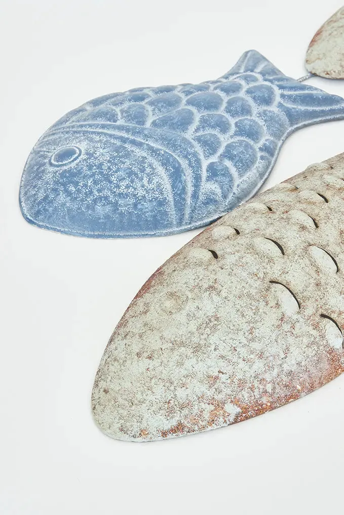 Banco de peces de hojalata para pared