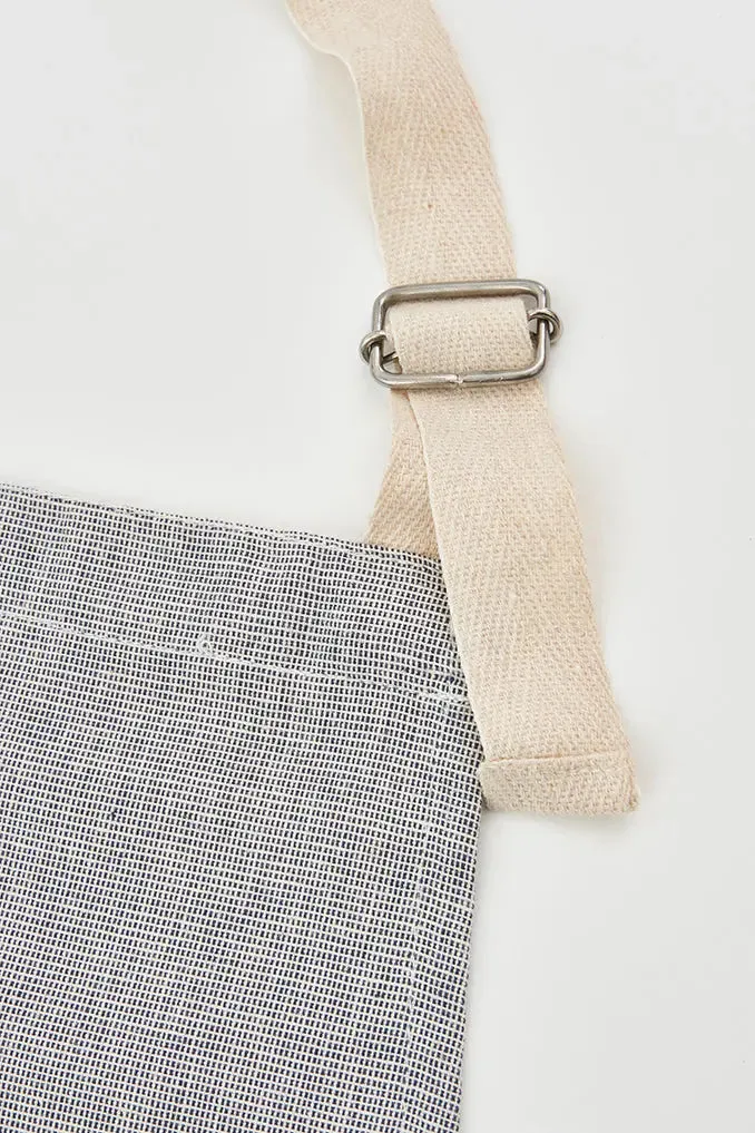 Delantal con peces en tejido chambray