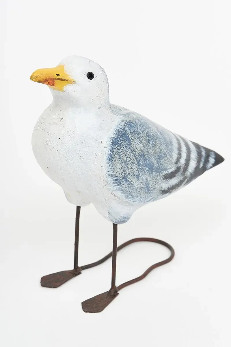 Pájaro de madera patas metal